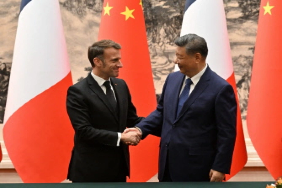 Macron calls on China to work for peace, rebalance trade